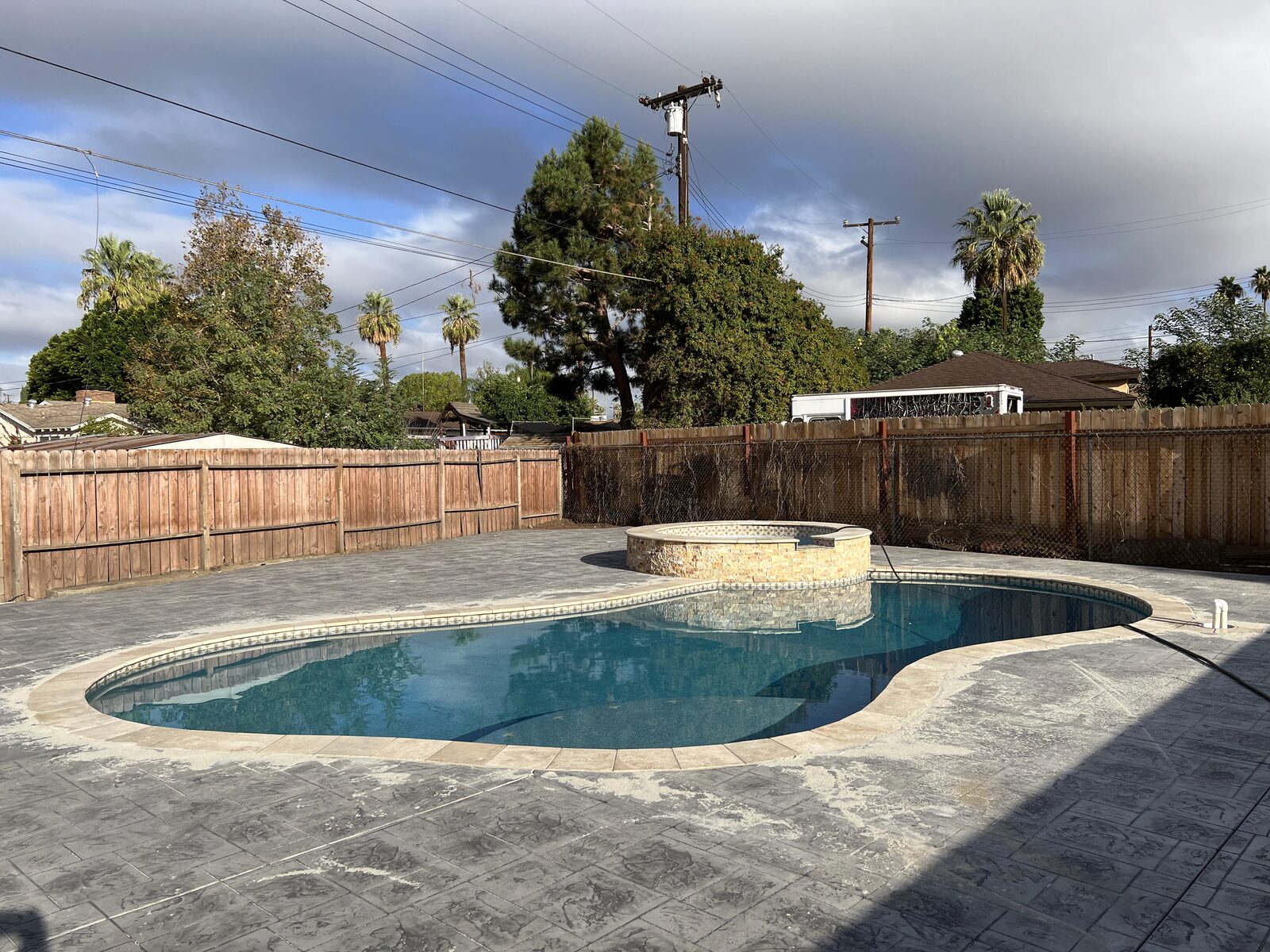 Pool and spa with paver decking